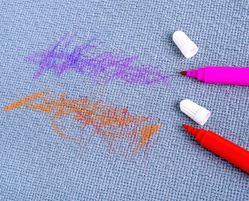 Ink and marker stain in the carpet